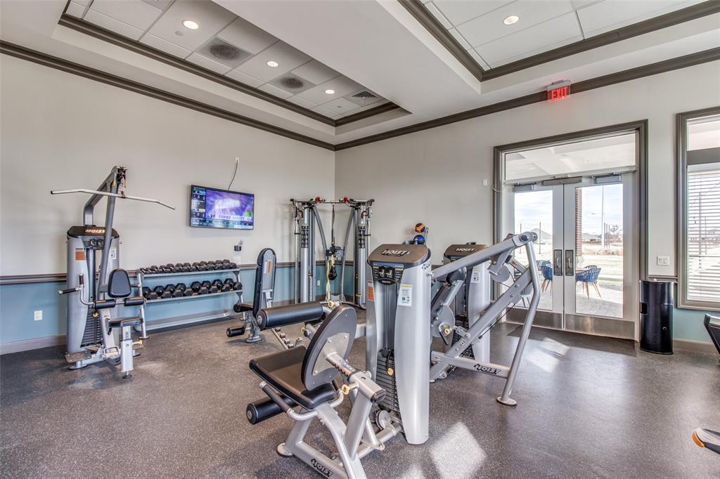 1605 Cedar Crest Drive Forney, TX 75126 - Photo 20 of 26 a view of a room with gym equipment