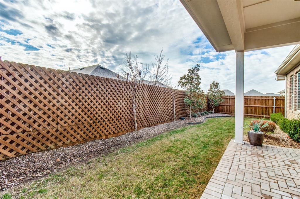 1605 Cedar Crest Drive Forney, TX 75126 - Photo 22 of 26 a view of a backyard