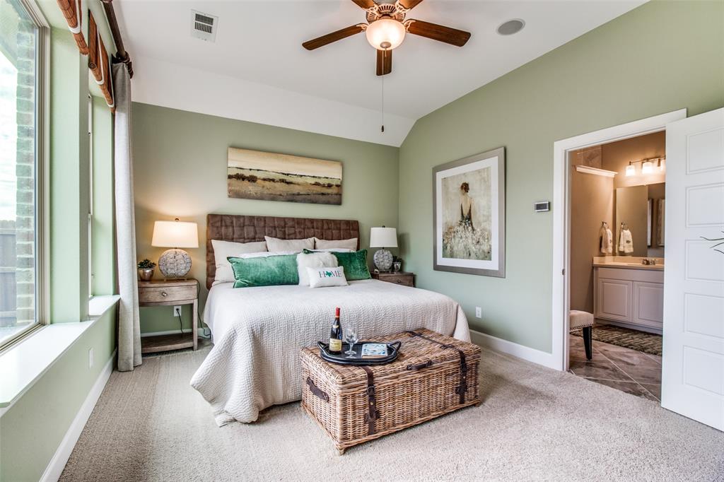 1605 Cedar Crest Drive Forney, TX 75126 - Photo 10 of 26 a bedroom with a bed lamp and furniture