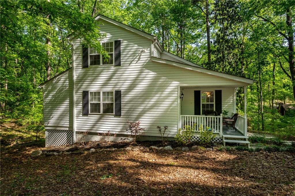 6143 Belle Meade Drive Villa Rica, GA 30180 - Photo 1 of 1 a view of a house with a yard