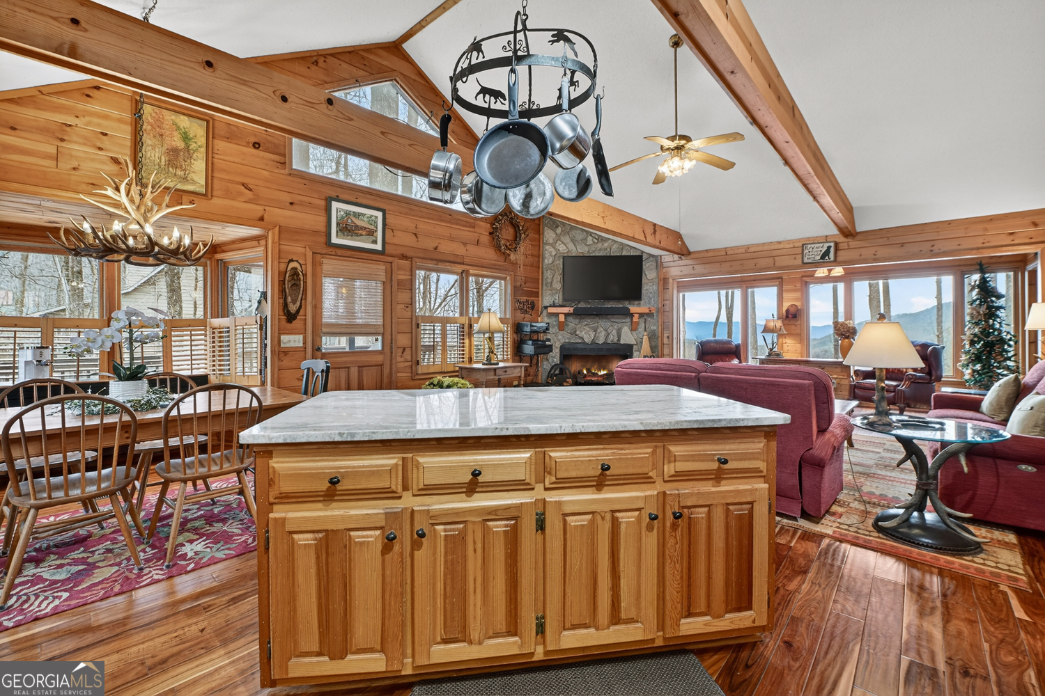 1189 Walnut Ridge, Unit 4044 Ellijay, GA 30536 - Photo 11 of 52 a view of a big room with many windows
