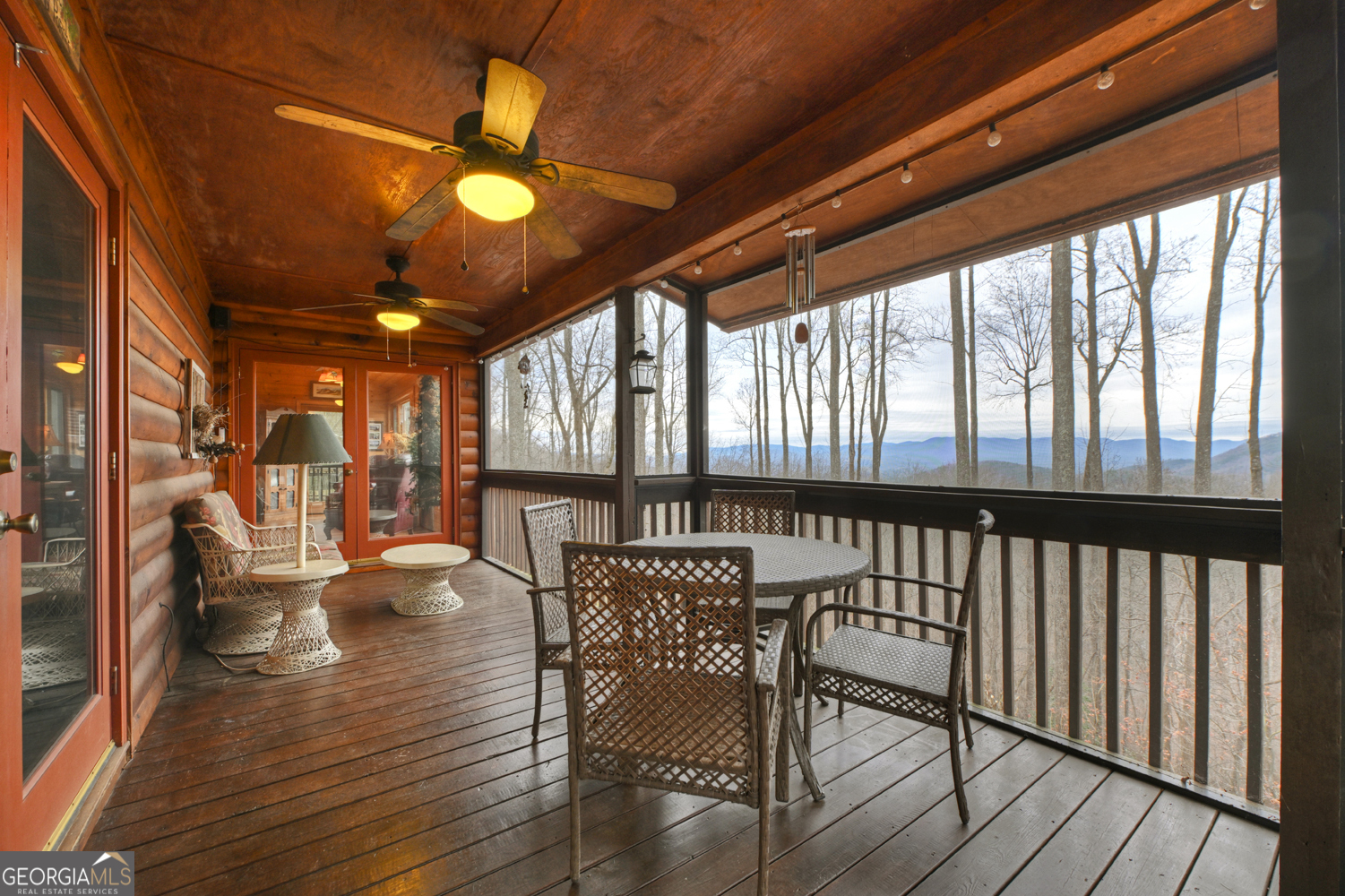 1189 Walnut Ridge, Unit 4044 Ellijay, GA 30536 - Photo 13 of 52 a view of a dining room with furniture window and wooden floor