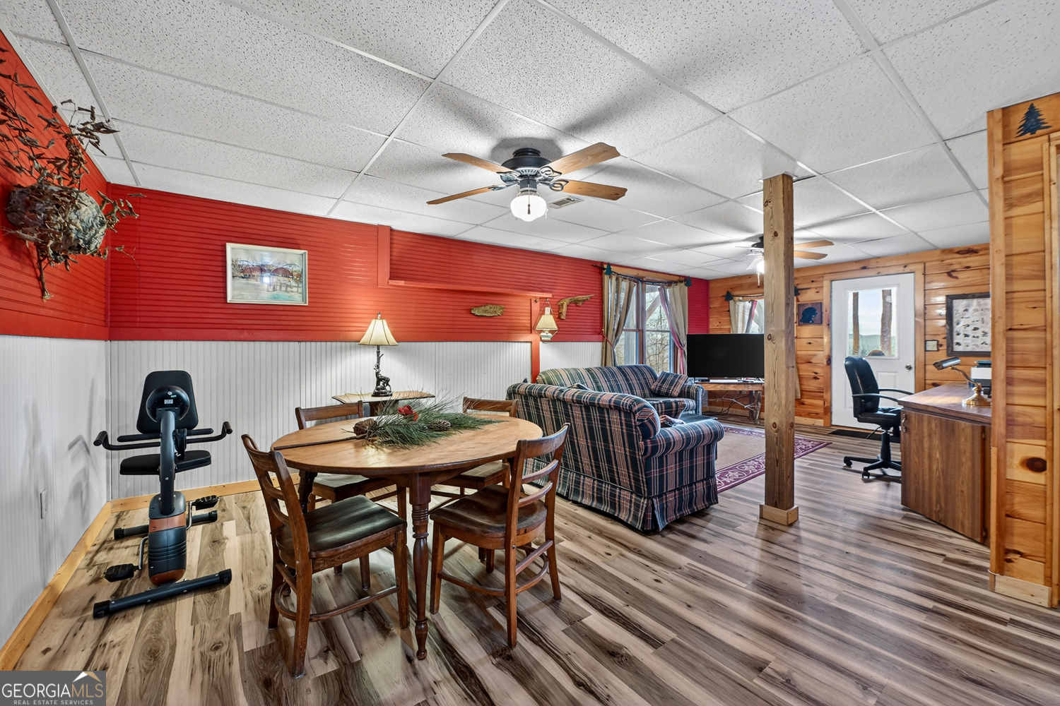 1189 Walnut Ridge, Unit 4044 Ellijay, GA 30536 - Photo 21 of 52 a view of a dining room with furniture window and wooden floor