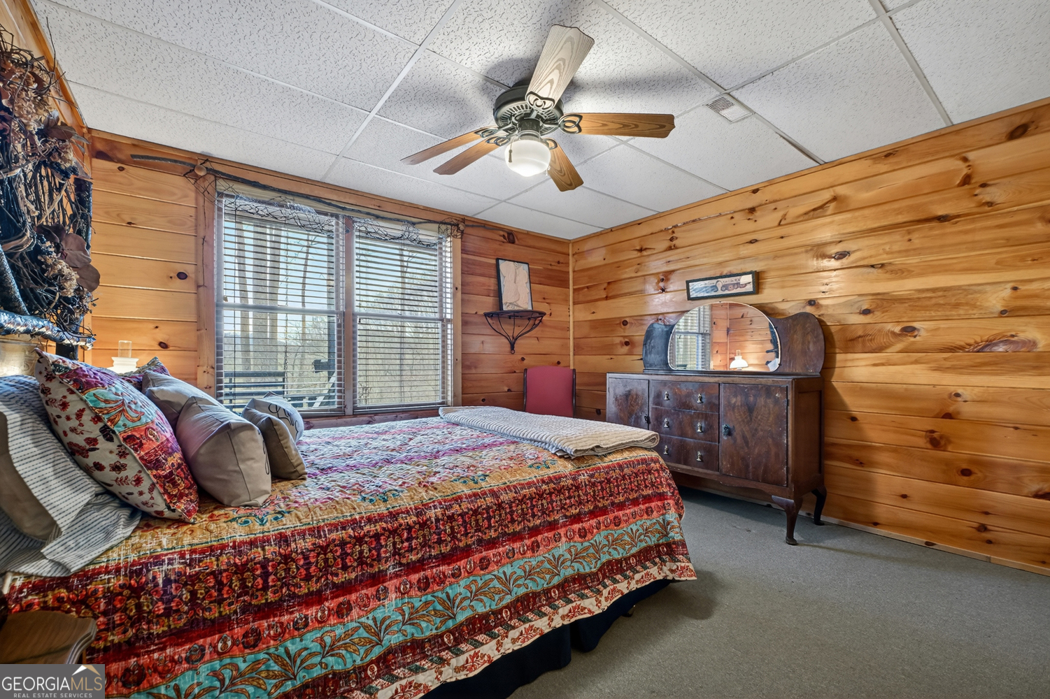 1189 Walnut Ridge, Unit 4044 Ellijay, GA 30536 - Photo 25 of 52 a bedroom with a bed and dresser