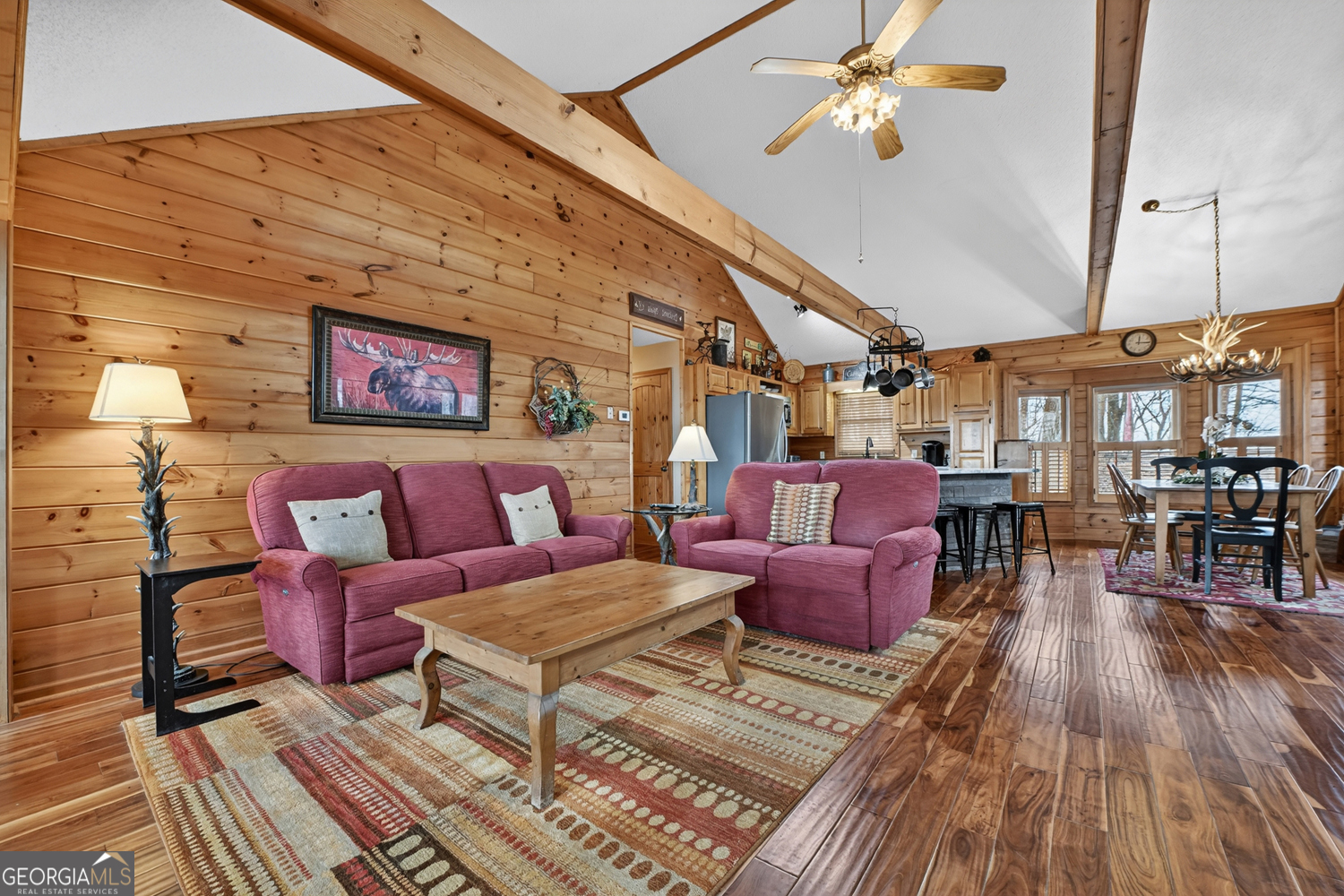 1189 Walnut Ridge, Unit 4044 Ellijay, GA 30536 - Photo 39 of 52 a living room with furniture and wooden floor