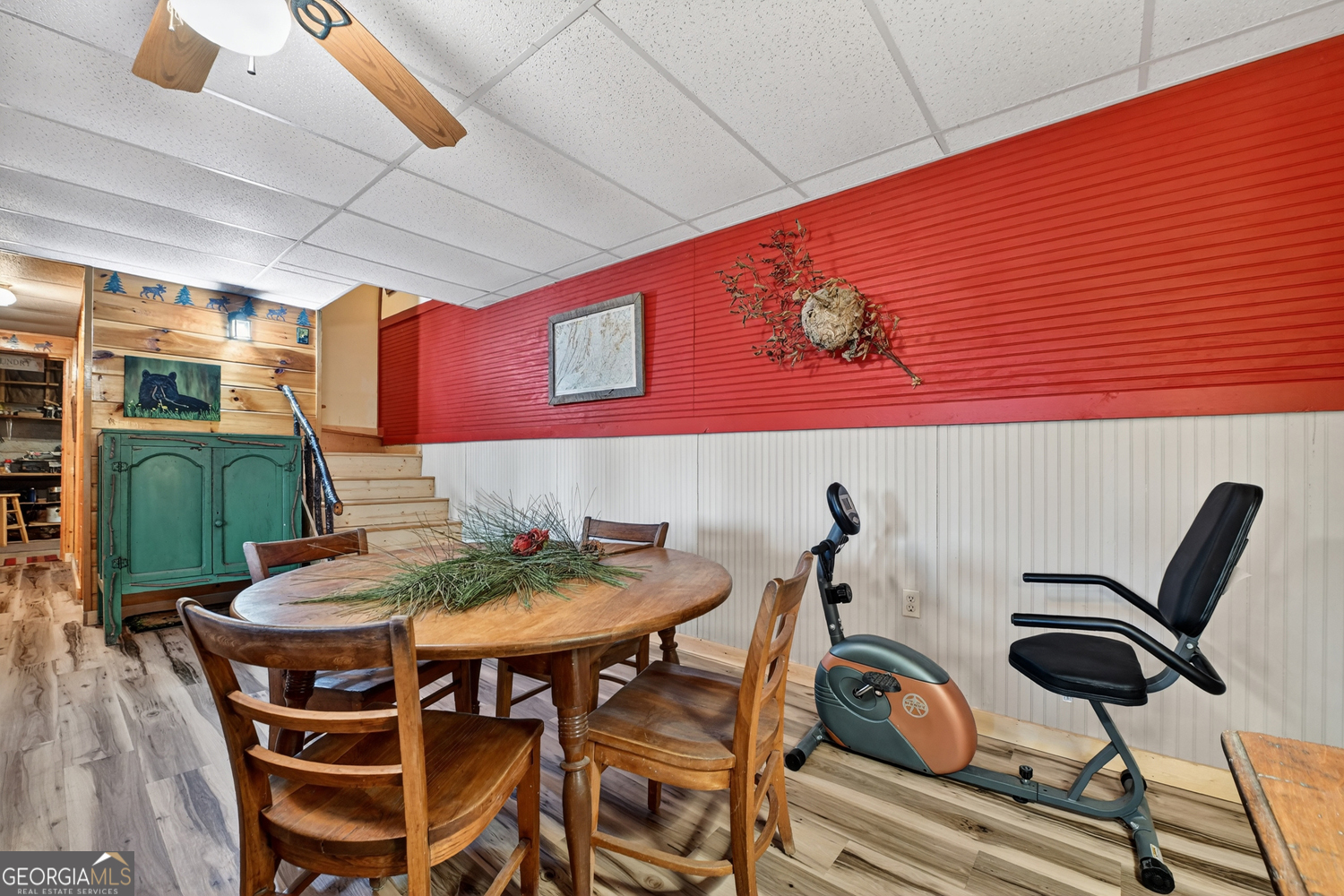 1189 Walnut Ridge, Unit 4044 Ellijay, GA 30536 - Photo 44 of 52 a view of a dining room with furniture and wooden floor