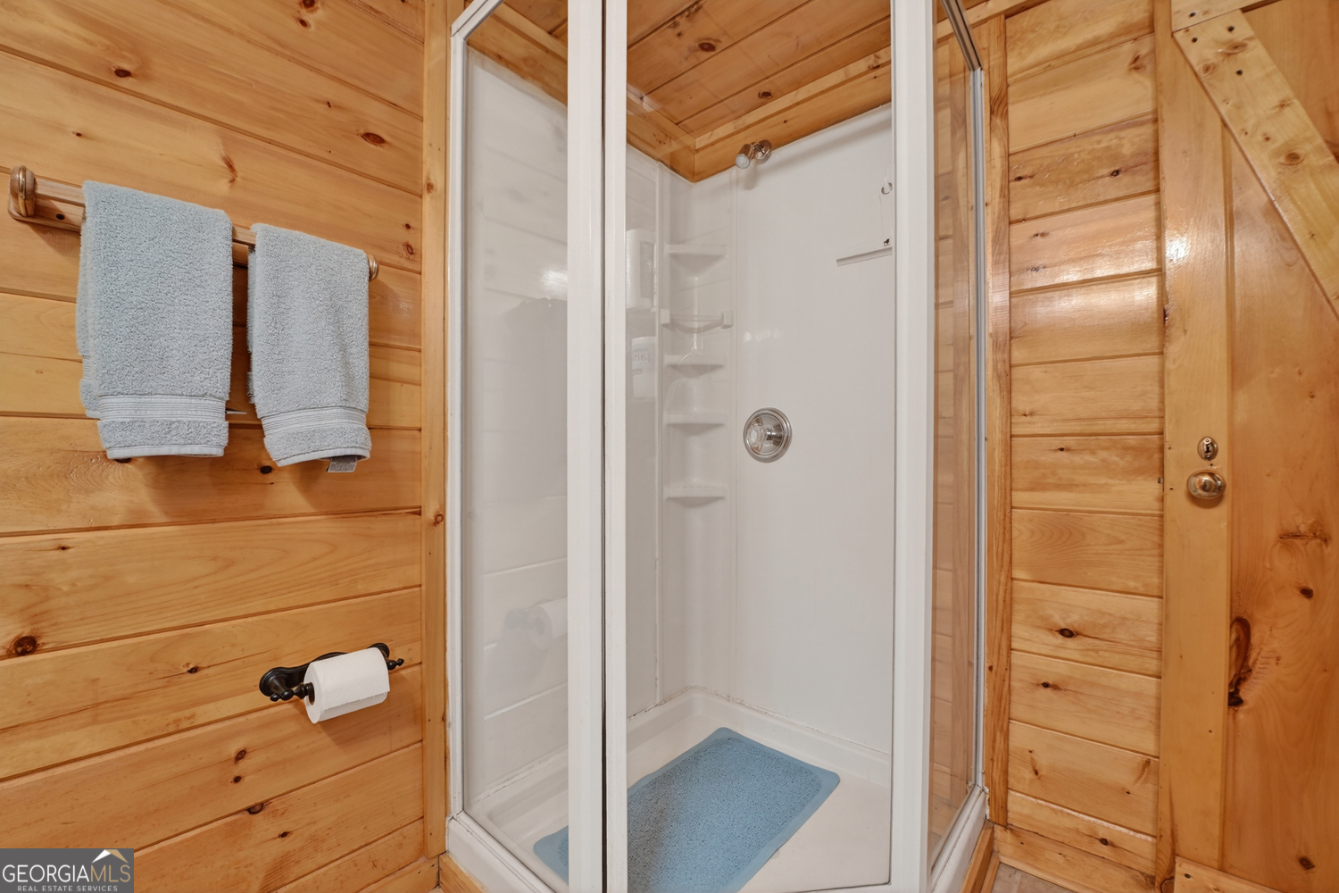 1189 Walnut Ridge, Unit 4044 Ellijay, GA 30536 - Photo 45 of 52 a bathroom with a shower