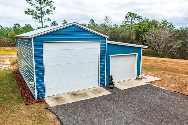 a view of a garage with wooden walls