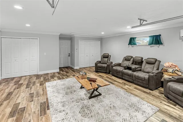 a living room with furniture and a rug