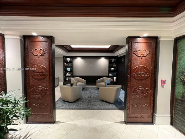 a living room with furniture and a projector