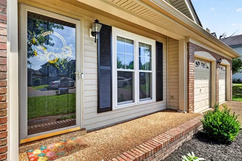 a front view of a house with a porch
