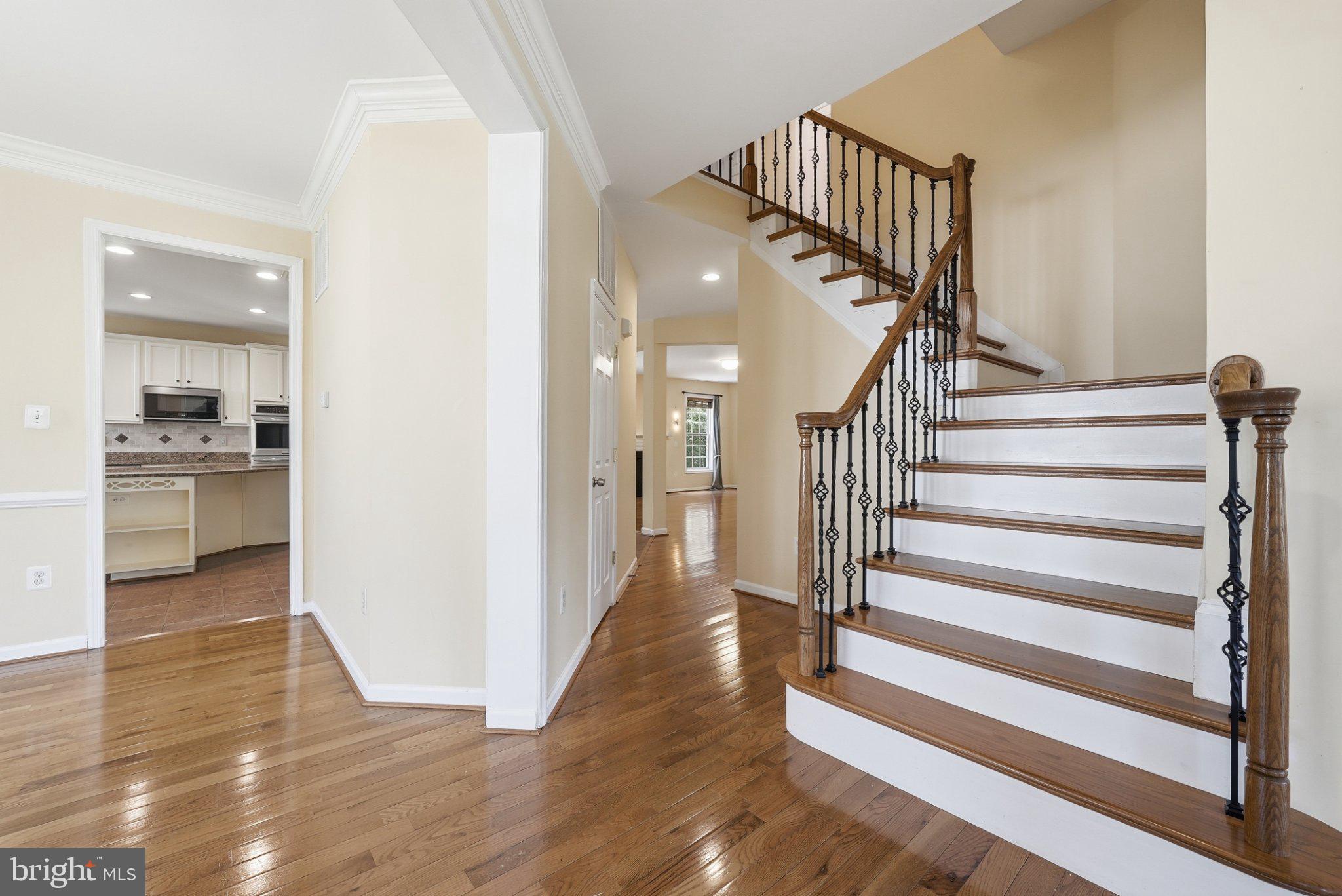 3679 Expedition Drive Triangle, VA 22172 - Photo 4 of 65 a view of entryway and hall with wooden floor