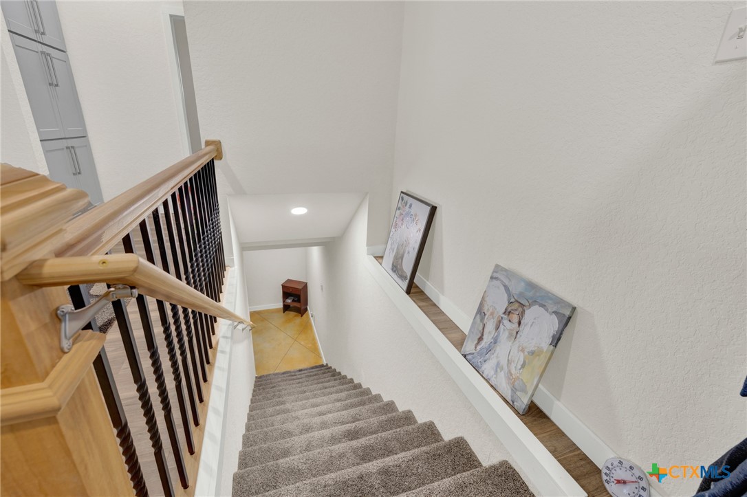 305 Lake Crest Spring Branch, TX 78070 - Photo 18 of 38 a view of a hallway with staircase