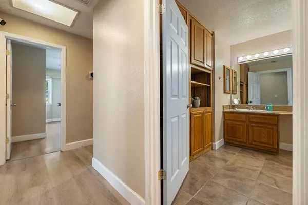 a view of a bathroom from the hallway
