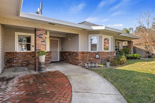 front view of house with a yard