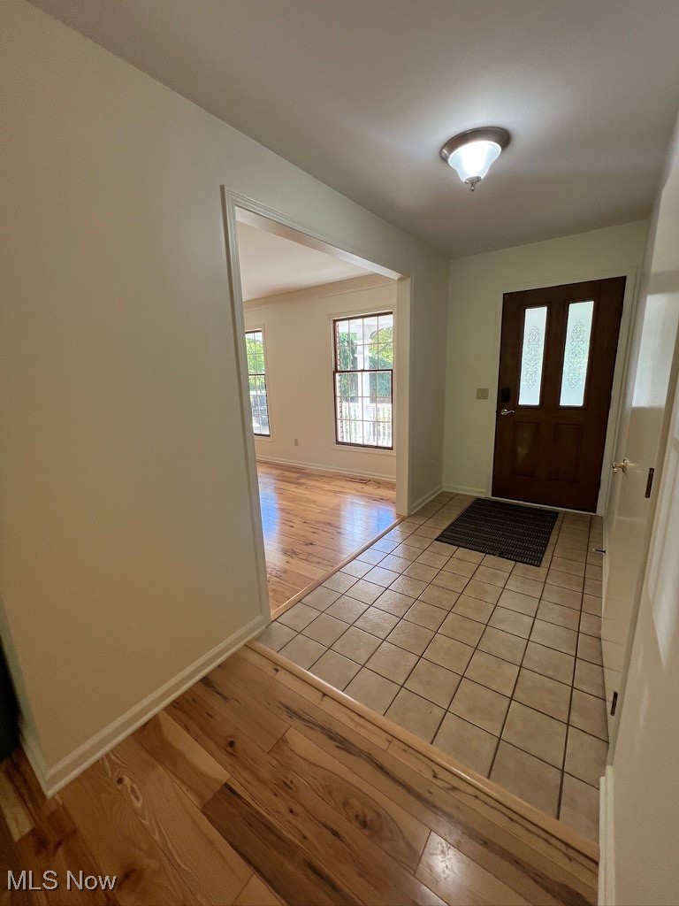 11331 Palmer Road Painesville, OH 44077 - Photo 3 of 47 Entrance foyer featuring light hardwood / wood-style floors