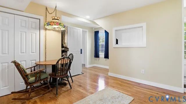 a view of a hallway with washer and dryer