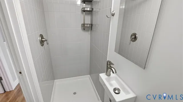 a view of a livingroom with furniture and wooden floor
