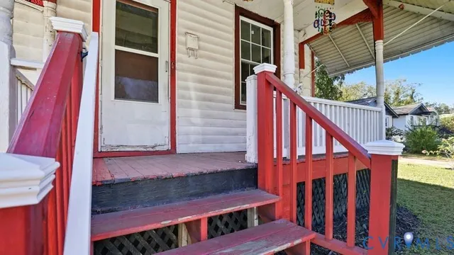 a balcony with wooden floor