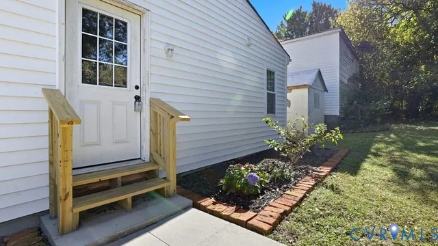 a view of a house with a garden