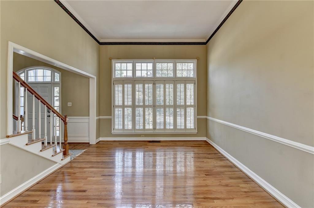 2382 Merrymount Drive Suwanee, GA 30024 - Photo 16 of 93 a view of an entryway with wooden floor
