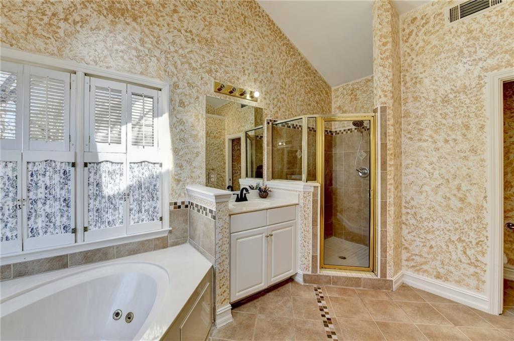 2382 Merrymount Drive Suwanee, GA 30024 - Photo 35 of 93 a bathroom with a double vanity sink mirror and shower