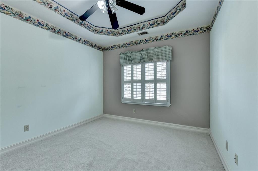 2382 Merrymount Drive Suwanee, GA 30024 - Photo 36 of 93 an empty room with windows