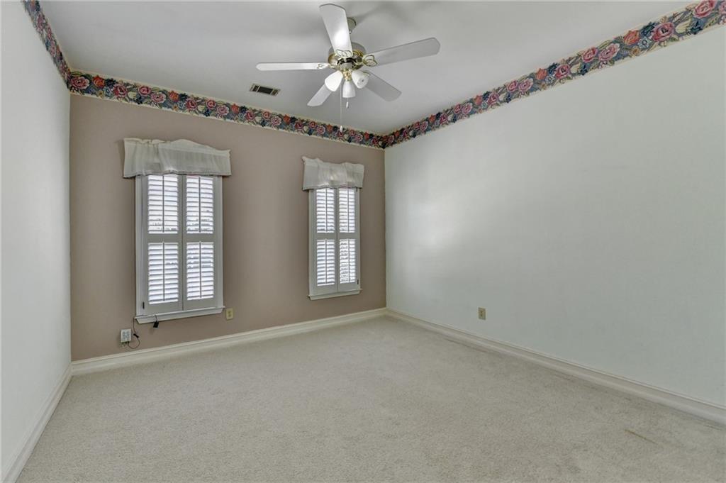 2382 Merrymount Drive Suwanee, GA 30024 - Photo 39 of 93 a view of an empty room with a window