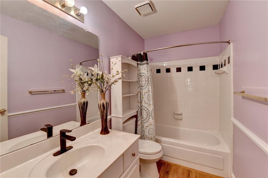 2382 Merrymount Drive Suwanee, GA 30024 - Photo 45 of 93 a bathroom with a sink toilet and shower