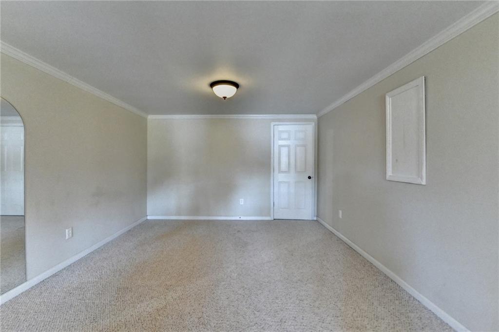 2382 Merrymount Drive Suwanee, GA 30024 - Photo 55 of 93 a view of an empty room with a window