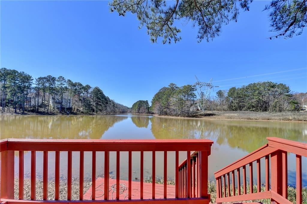 2382 Merrymount Drive Suwanee, GA 30024 - Photo 61 of 93 a view of a lake from a balcony