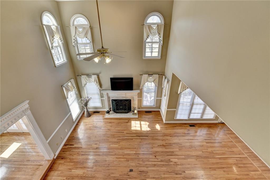 2382 Merrymount Drive Suwanee, GA 30024 - Photo 8 of 93 a view of living room with furniture and a fireplace
