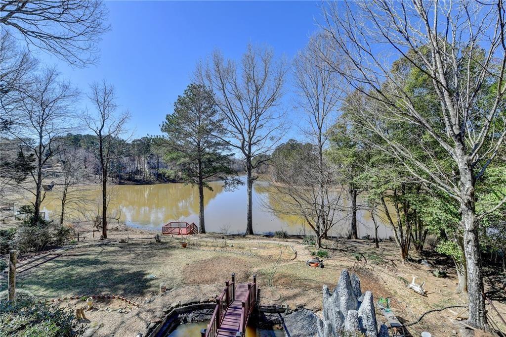 2382 Merrymount Drive Suwanee, GA 30024 - Photo 82 of 93 a view of outdoor space with trees