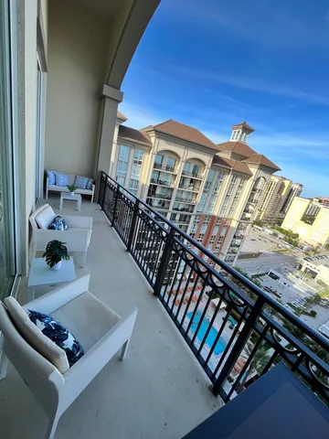 a view of living room with furniture and a window
