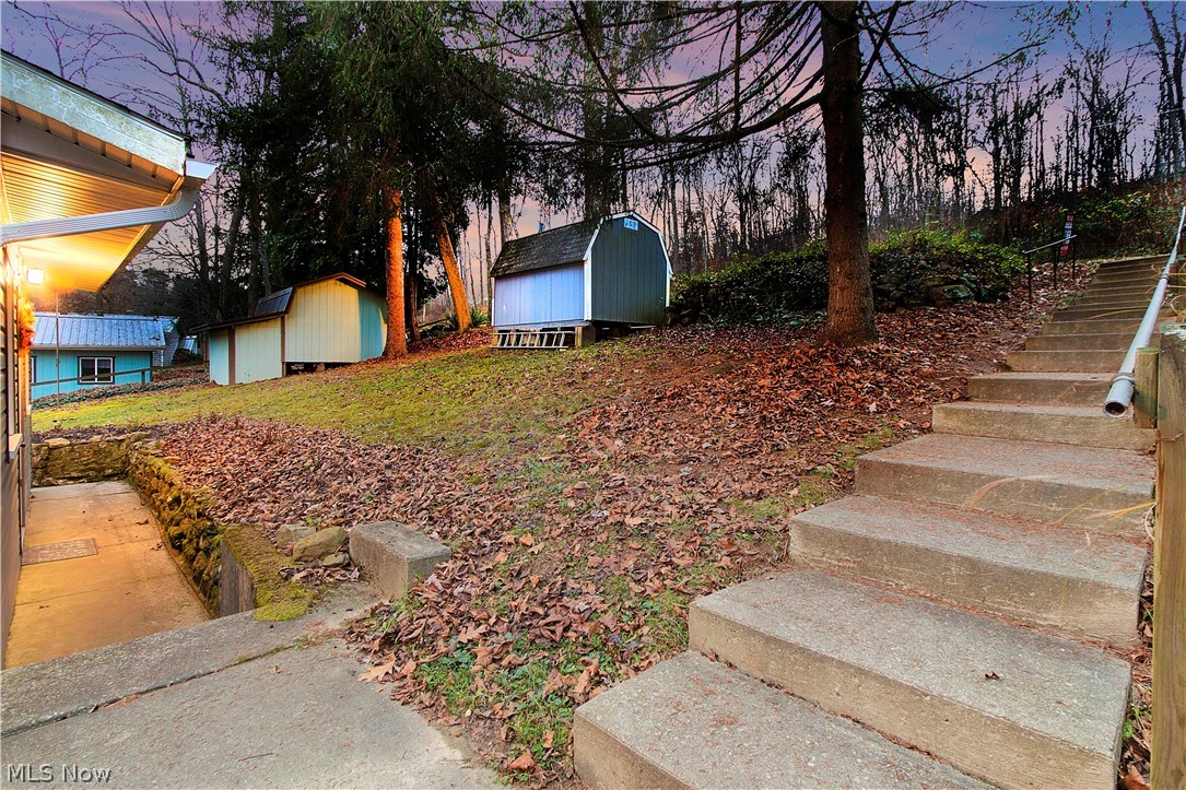 556 Bramble Road Southwest Carrollton, OH 44615 - Photo 11 of 34 Concrete steps shared with neighboring house