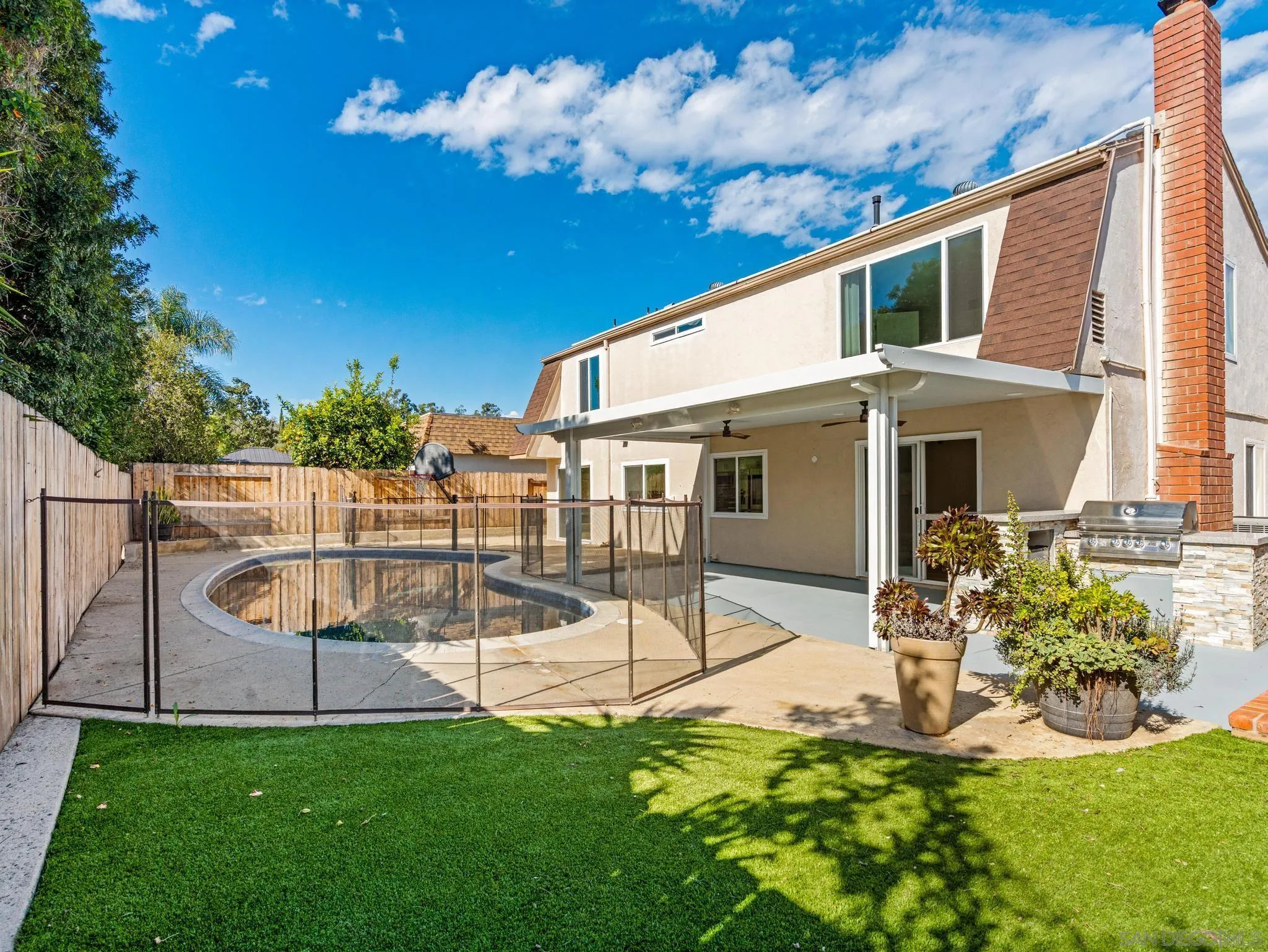 13303 Betty Lee Way Poway, CA 92064 - Photo 14 of 32 a view of a house with backyard