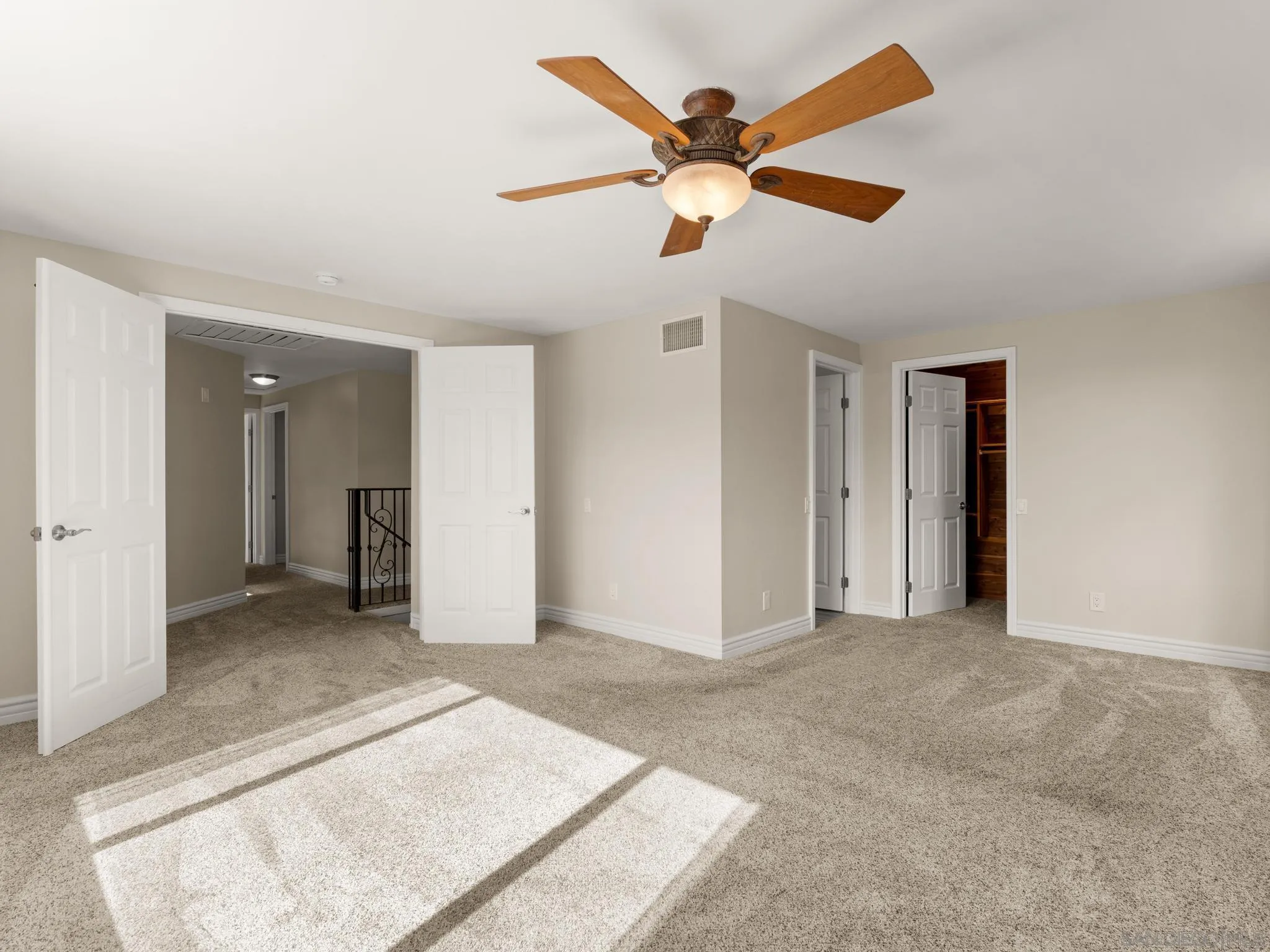13303 Betty Lee Way Poway, CA 92064 - Photo 21 of 32 a view of a livingroom with a ceiling fan