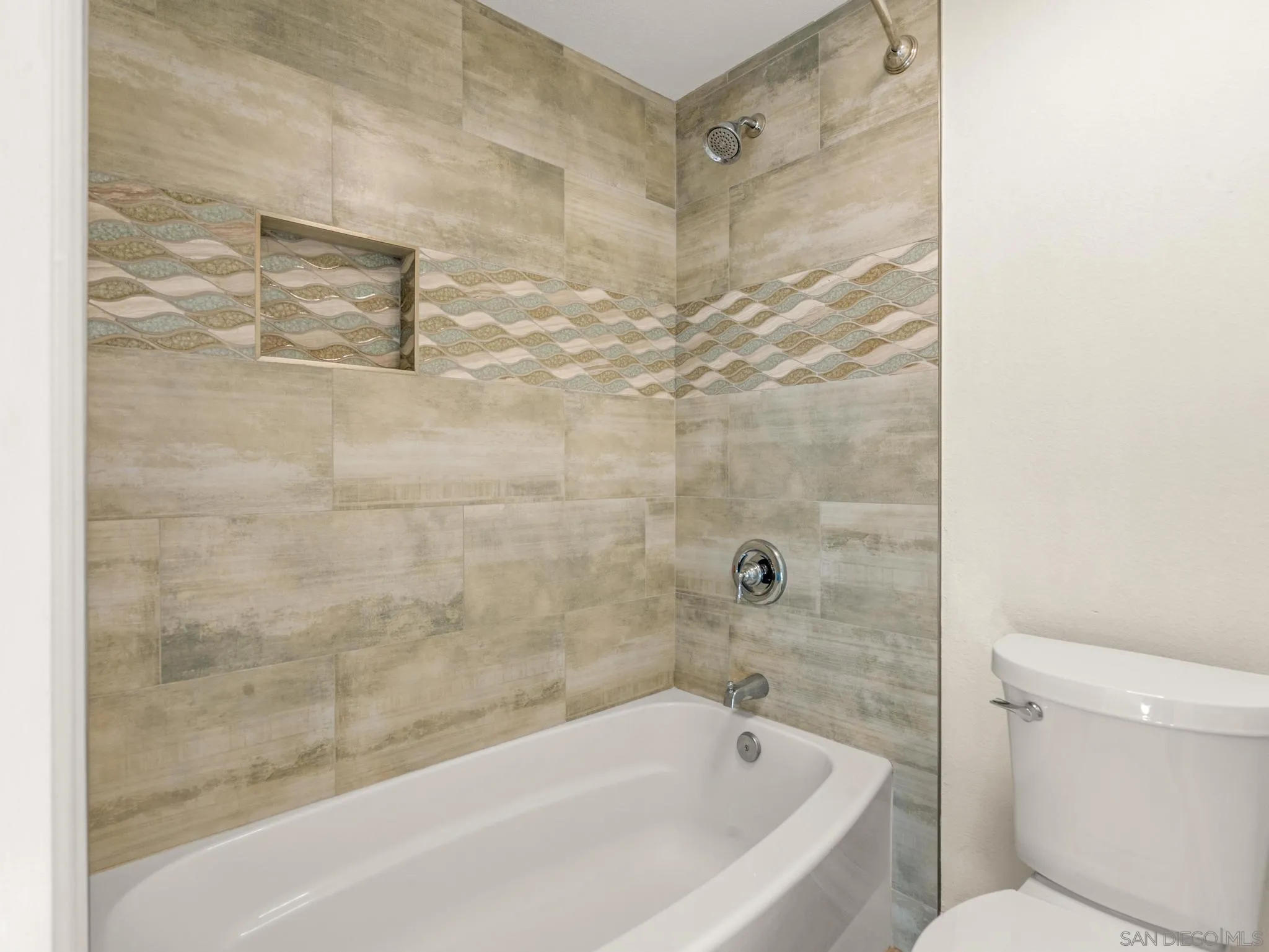 13303 Betty Lee Way Poway, CA 92064 - Photo 28 of 32 a bathroom with a bathtub and a shower