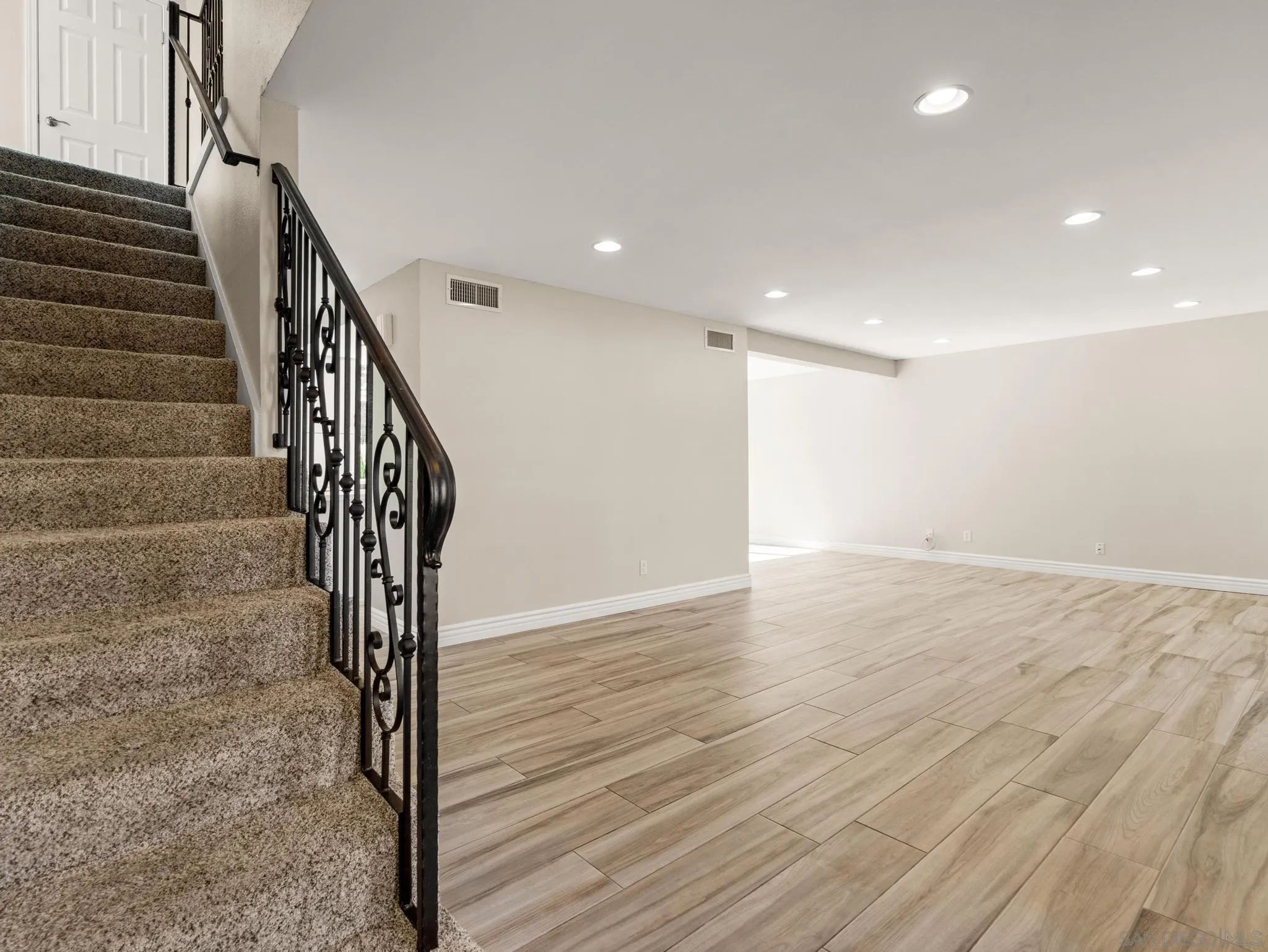 13303 Betty Lee Way Poway, CA 92064 - Photo 4 of 32 a view of entryway and hall with wooden floor