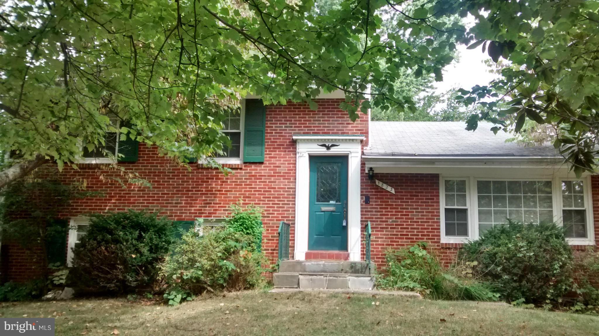 1823 Franwall Avenue Silver Spring, MD 20902 - Photo 1 of 1 a view of a house with a tree