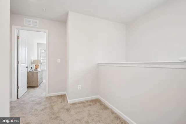 a utility room with a sink dryer and washer