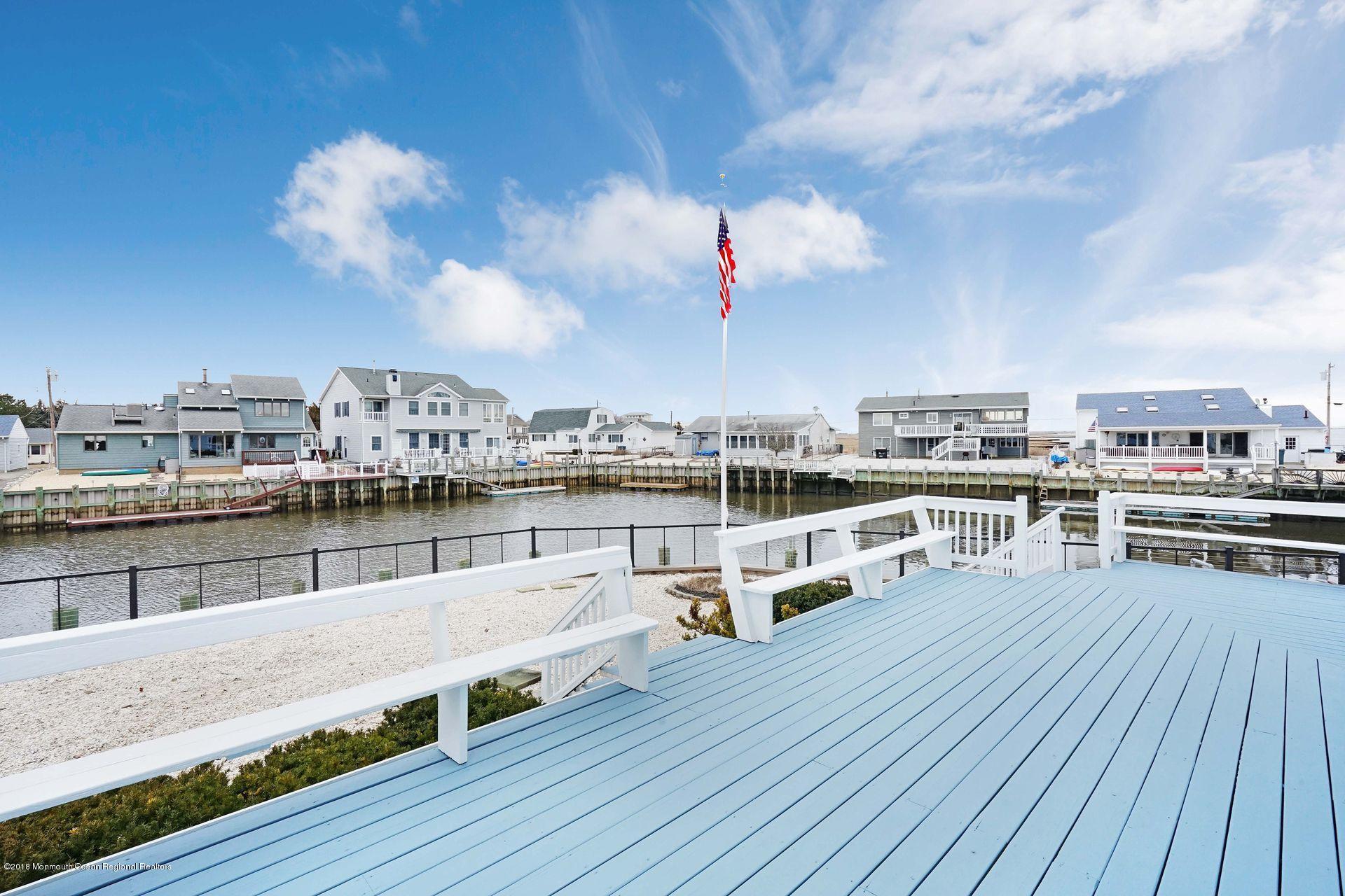 53 Kansas Road Little Egg Harbor, NJ 08087 - Photo 34 of 76 Side deck with seating