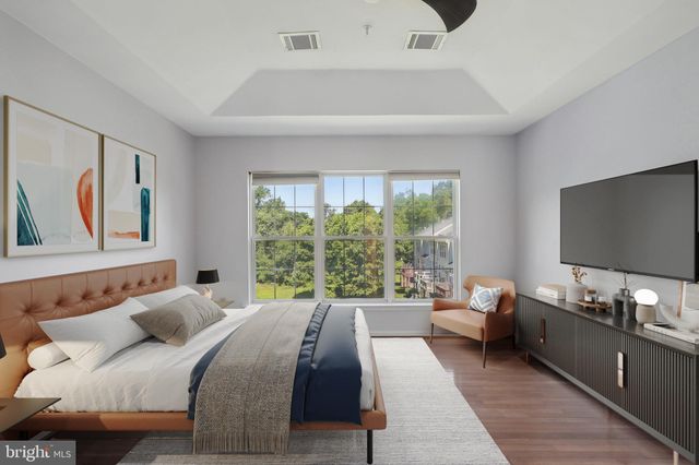 a living room with a couch and a flat screen tv