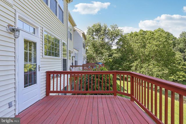 a view of a wooden roof deck