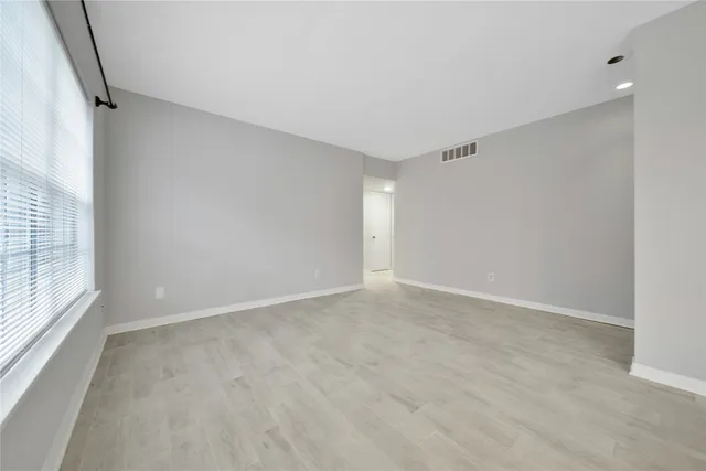 a kitchen that has a sink and a stove