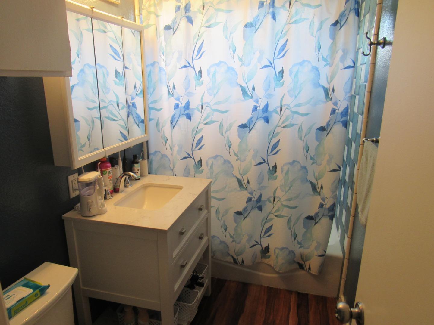 3038 King Circle Marina, CA 93933 - Photo 11 of 21 a bathroom with a sink toilet and a mirror