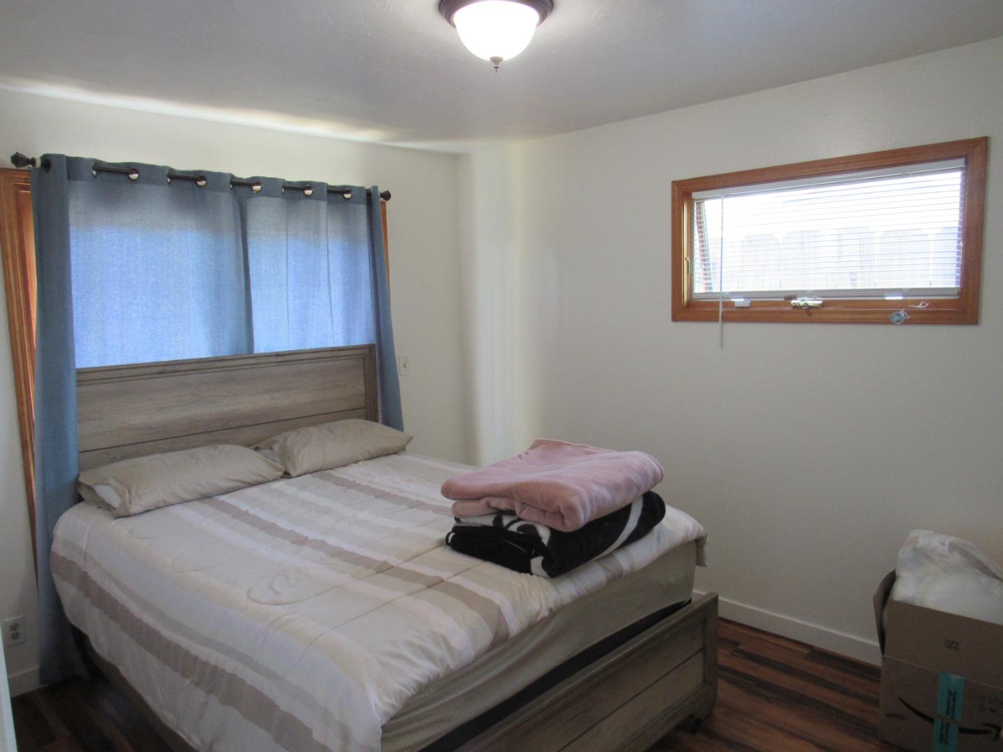 3038 King Circle Marina, CA 93933 - Photo 13 of 21 a bedroom with a bed and a window