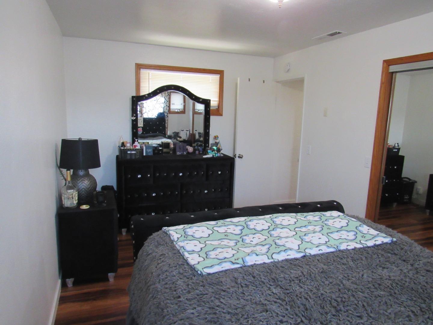 3038 King Circle Marina, CA 93933 - Photo 14 of 21 a bedroom with a bed and a dresser