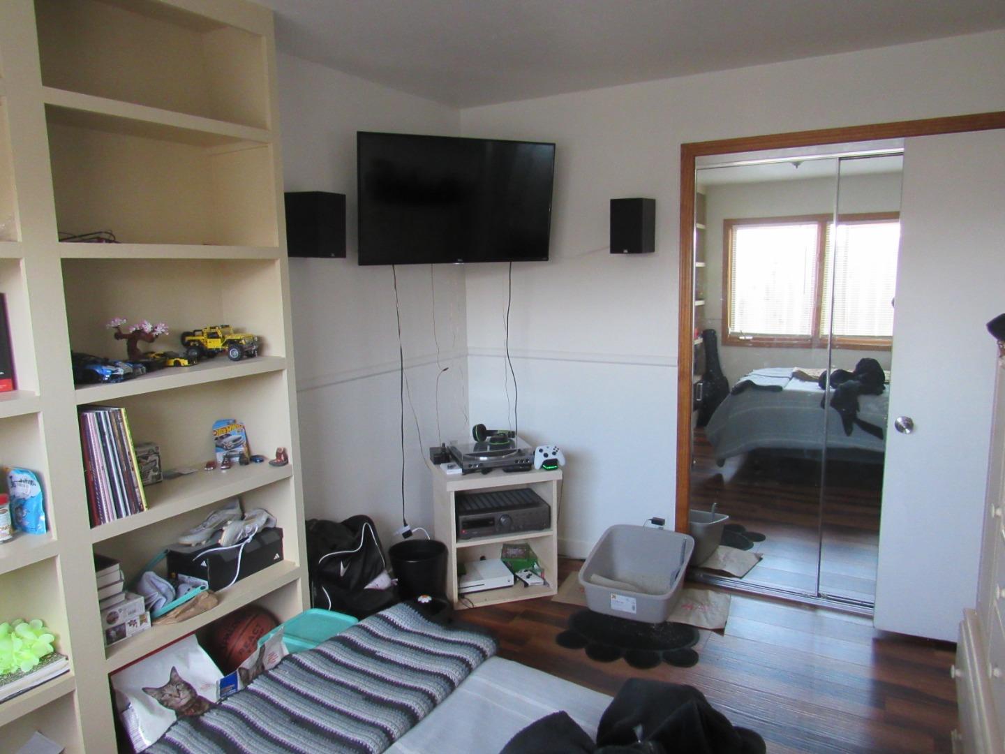 3038 King Circle Marina, CA 93933 - Photo 16 of 21 a living room with furniture and a flat screen tv