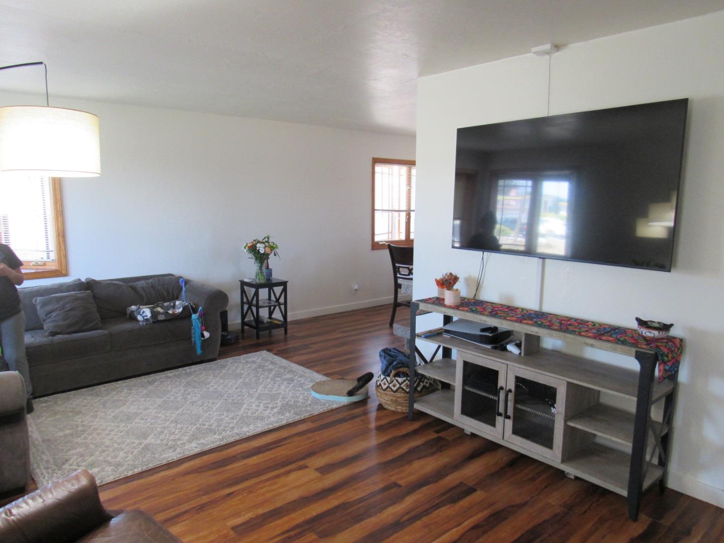 3038 King Circle Marina, CA 93933 - Photo 4 of 21 a living room with furniture and a flat screen tv